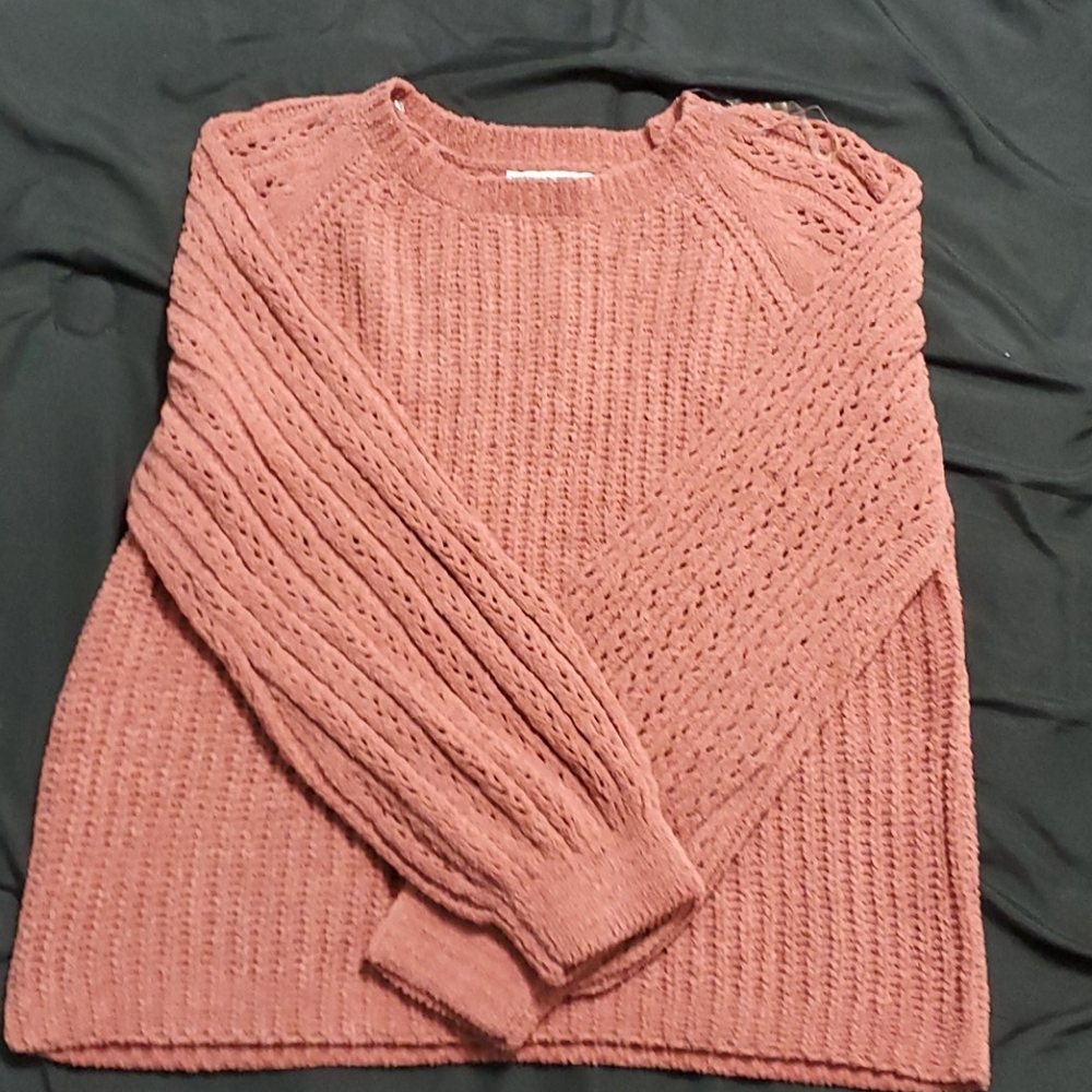 Pink knitted sweater